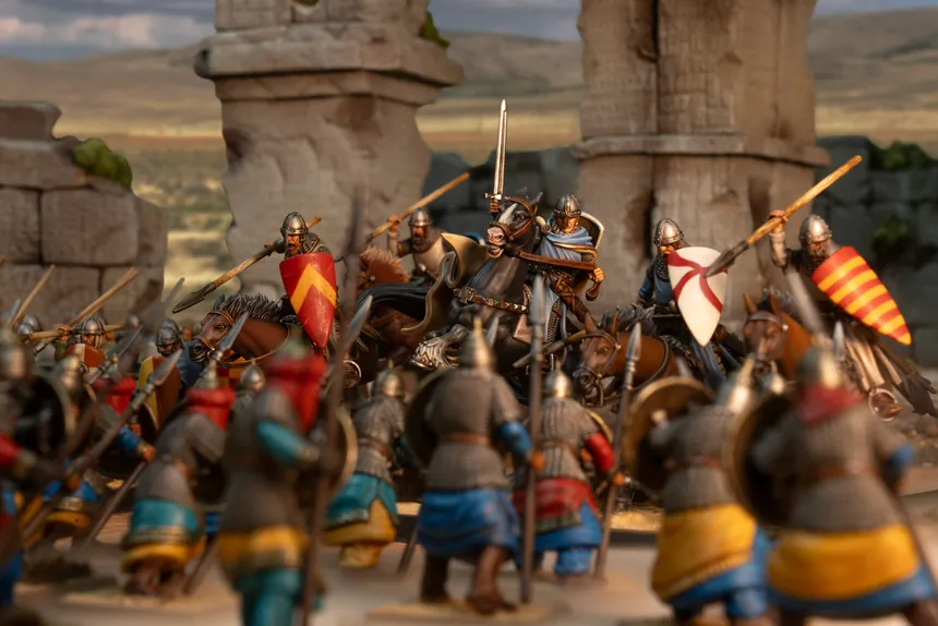 Ghulam Footmen bracing as Crusader knights charge between ruined columns